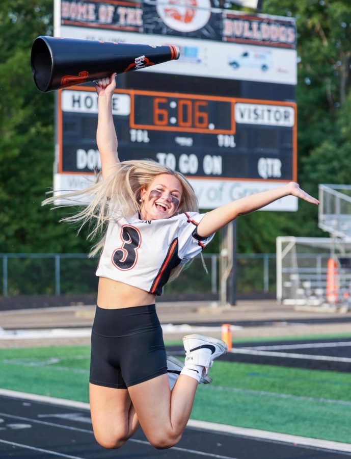 Maddy Elsass is jumping before the Homecoming game versus Mckinley.