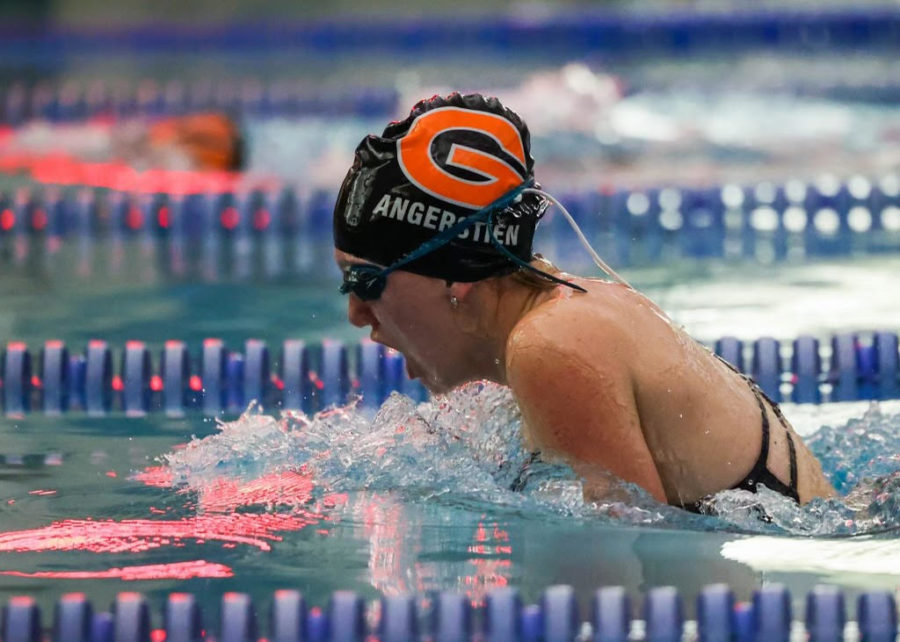 Kali Angerstien swimming in the 100 breaststroke.