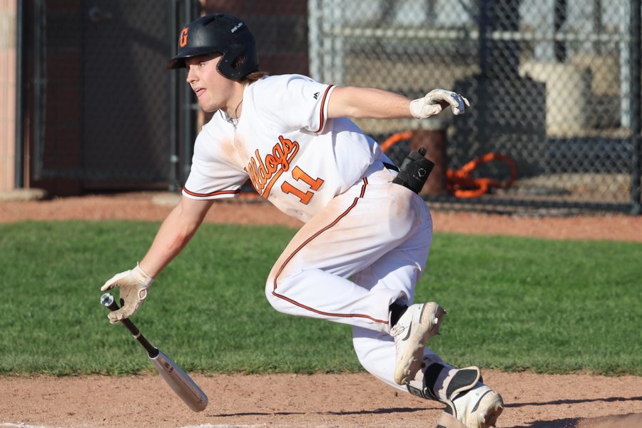 Ickes drops the bat after a hit and takes off to first